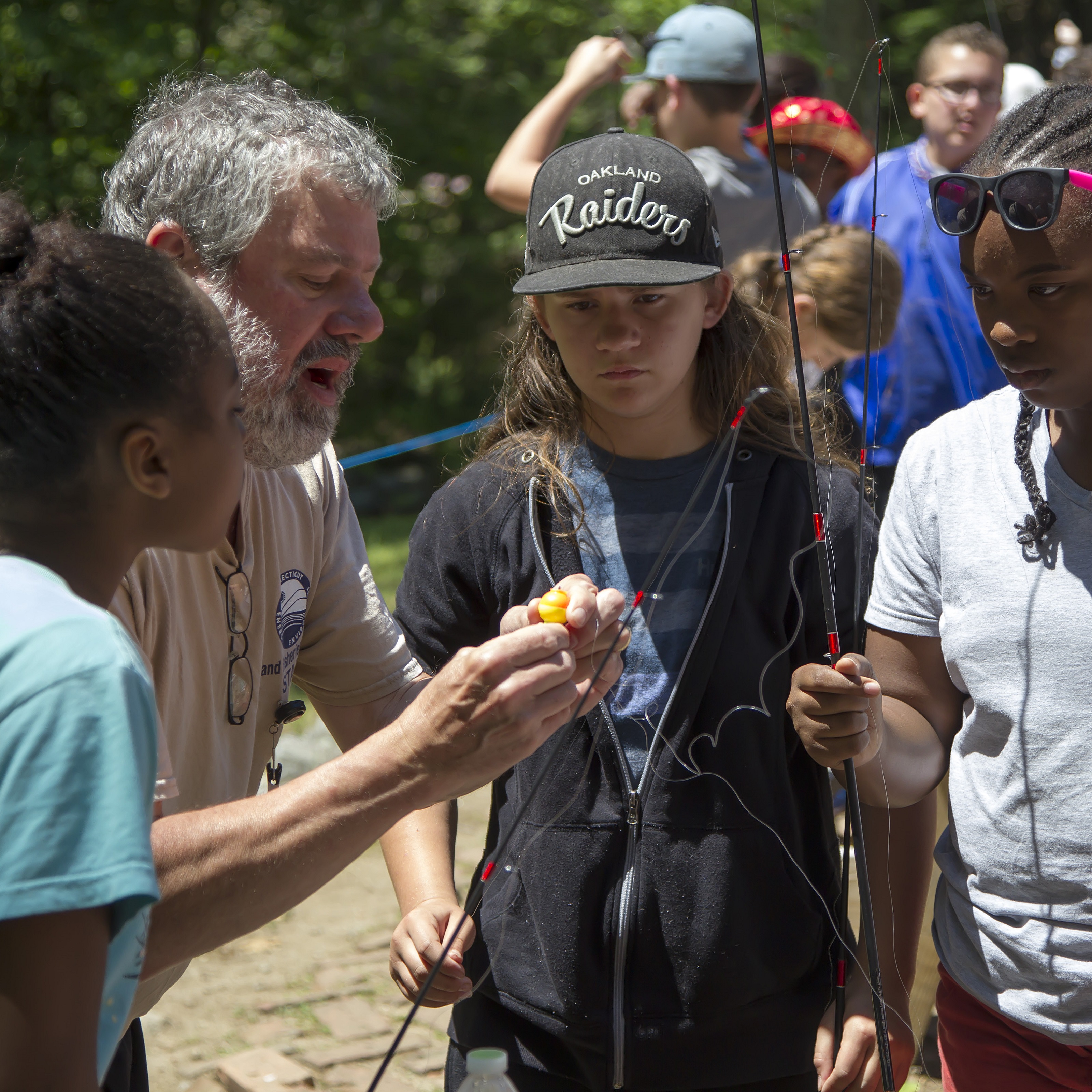 CARE Coordinator Tom Bourret teaching students.