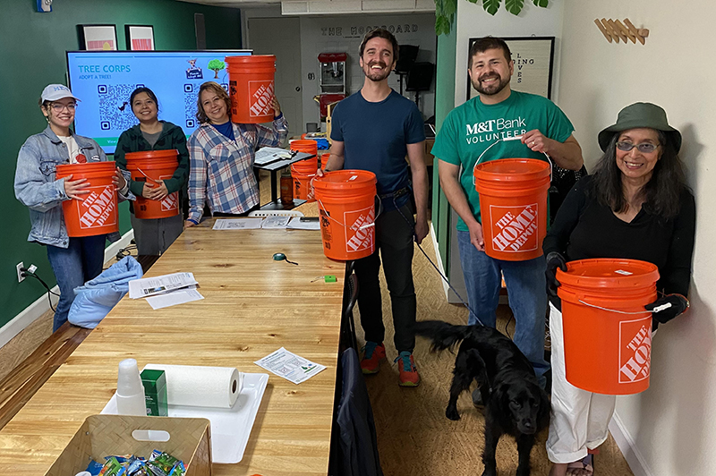 Groundwork Bridgeport volunteers with tree care kits 
